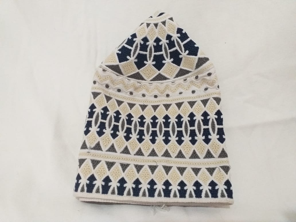 Elegant Tradition in Every Stitch , Omani Kumma